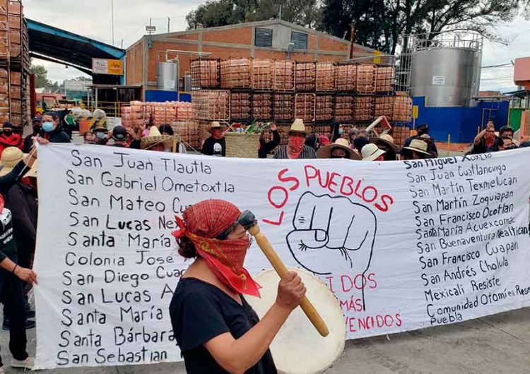 Pobladores de Juan C. Bonilla irrumpen en Bonafont y hacen daños