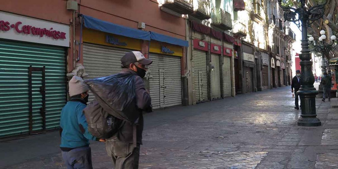 HOY, comercios de Puebla BAJARÁN CORTINAS para evitar destrozos de feministas