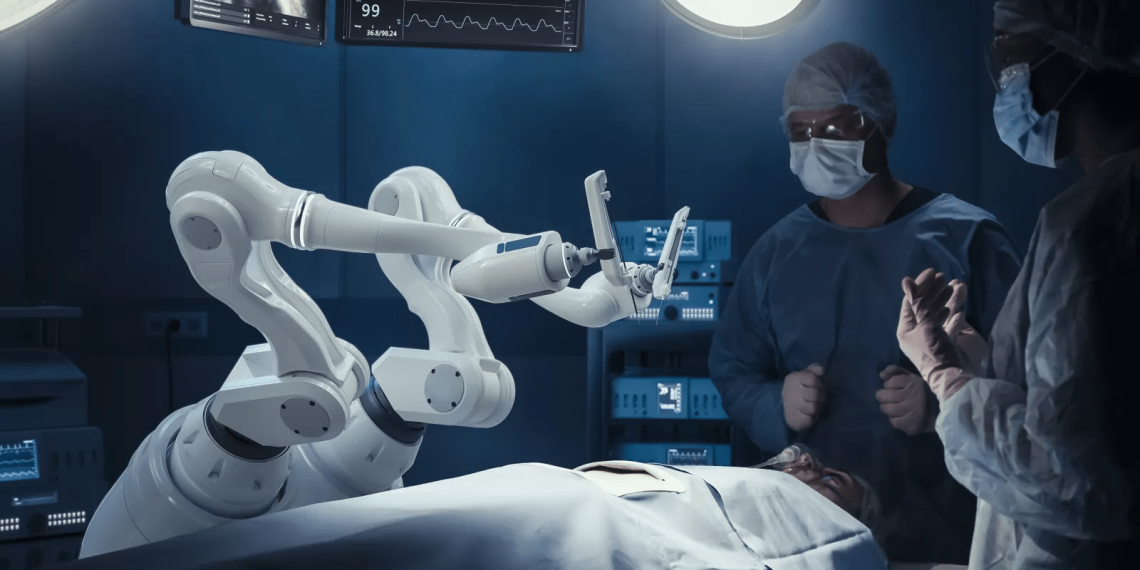 La imagen muestra cirujanos observando brazos robóticos automatizados de alta precisión operando a un paciente. GORODENKOFF/GETTY