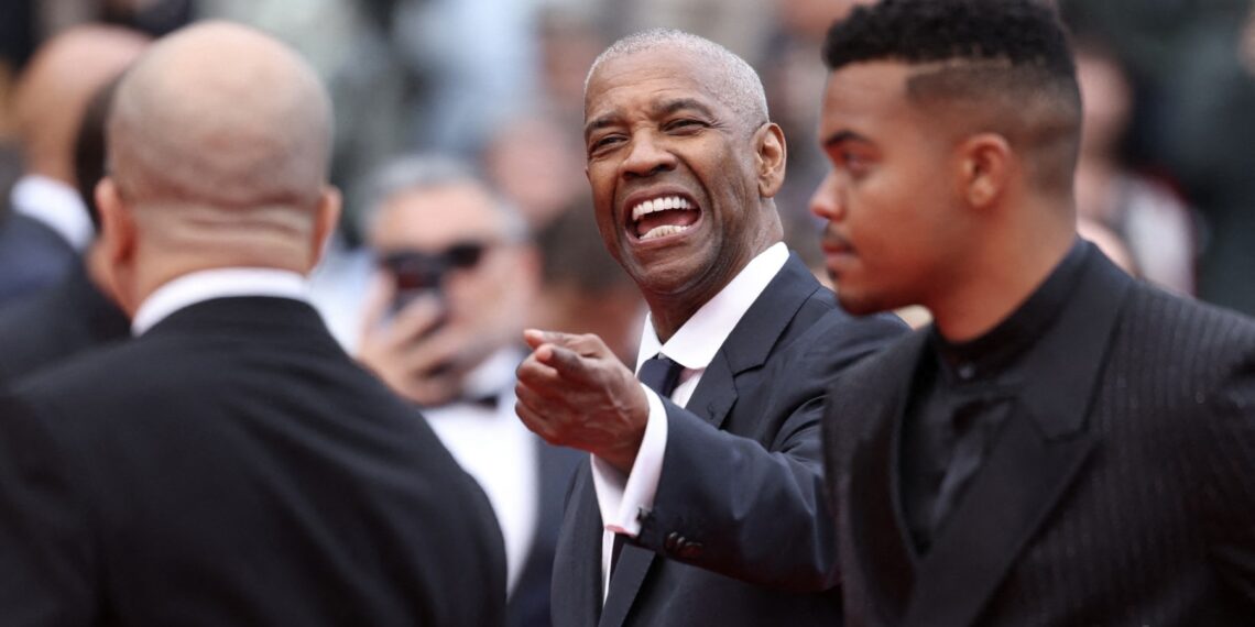 Denzel Washington en la alfombra roja en Cannes. (Photo by Sameer AL-DOUMY / AFP)
